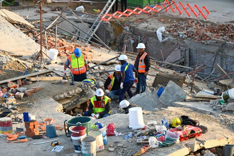 Five killed and dozens buried by South Africa building collapse